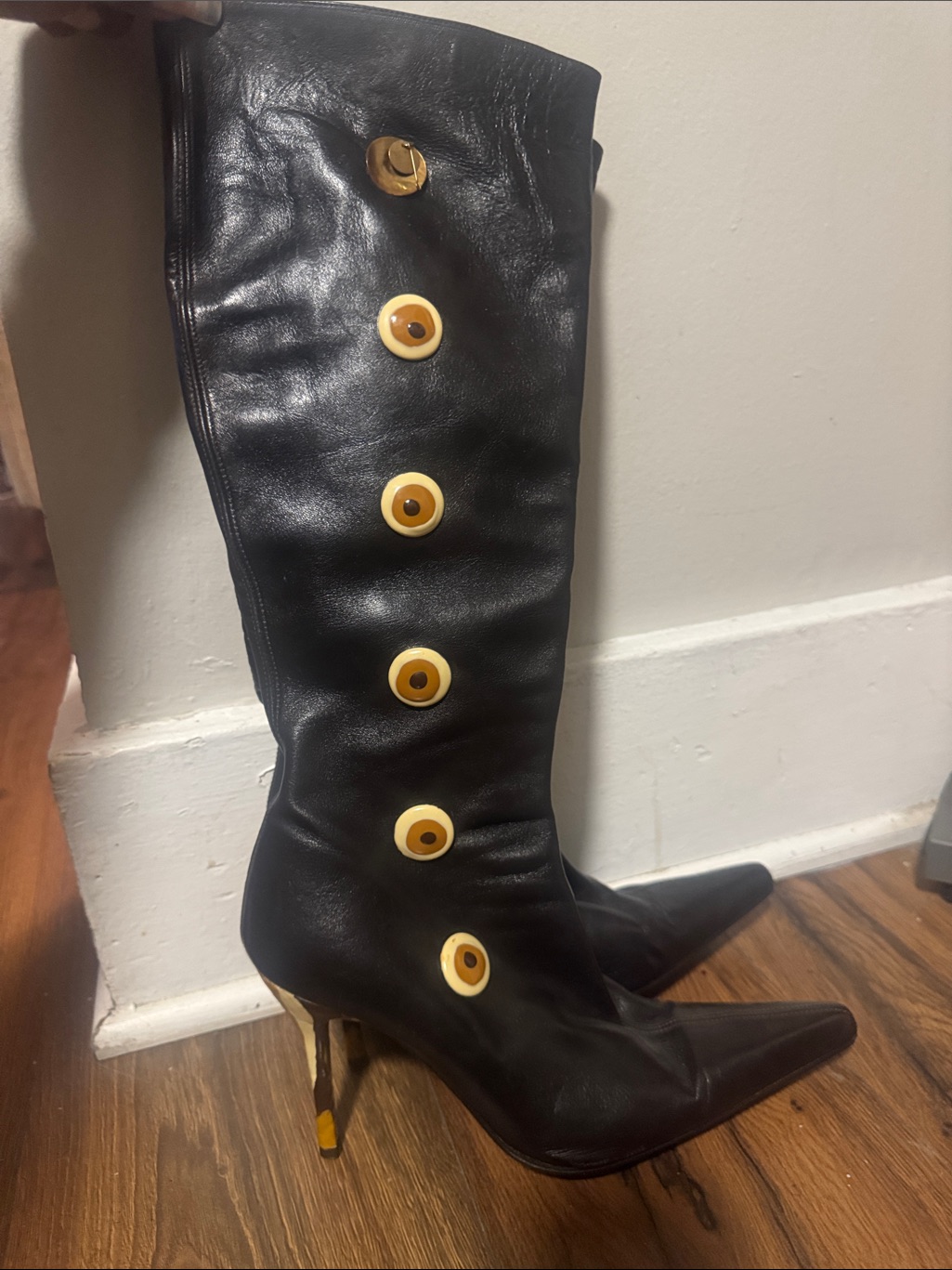 Paloma Barcelo Black Leather Knee-High Boots With Cream-Gold Button Accents